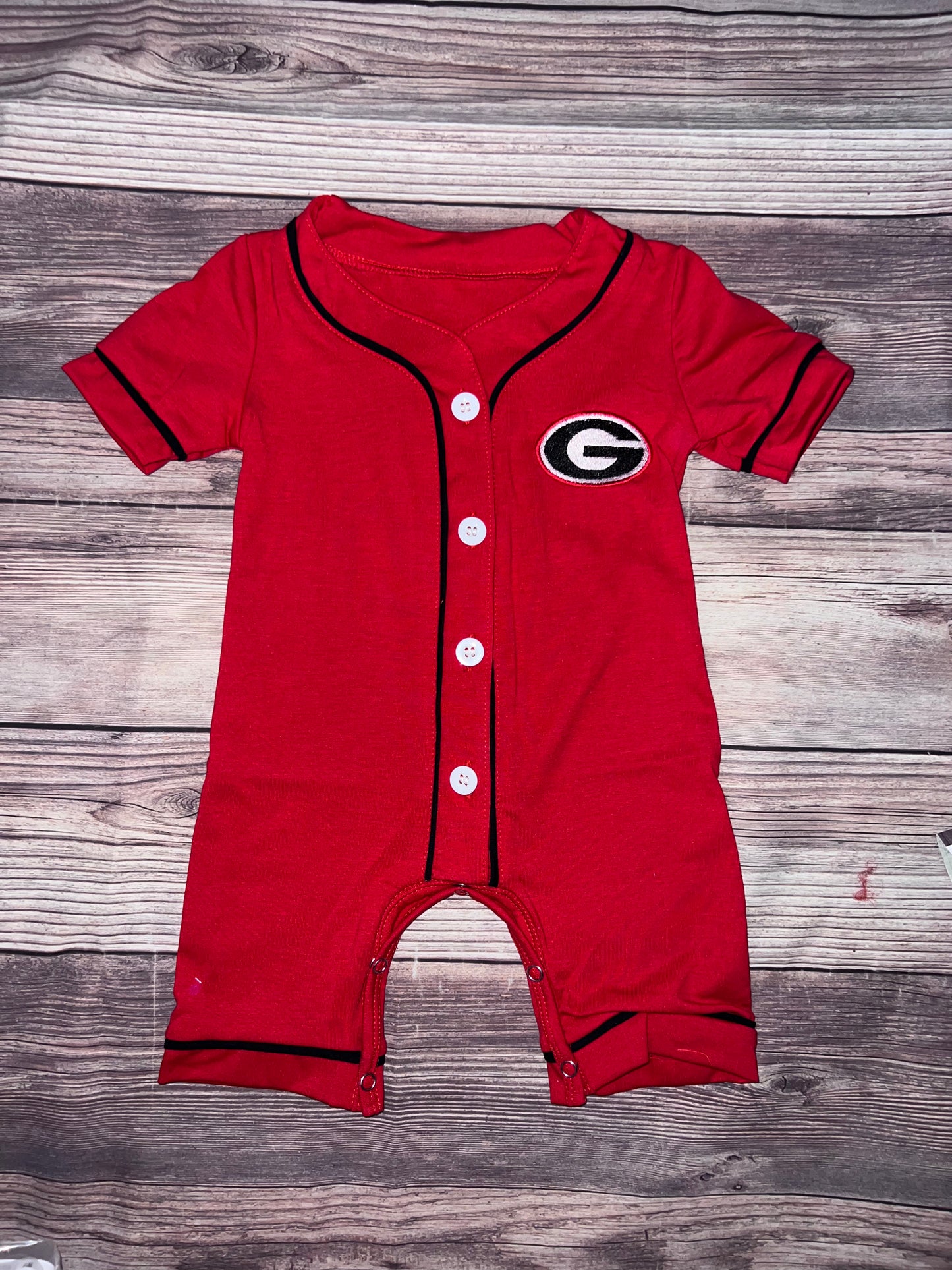 red and black G button romper